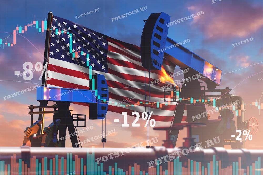 Фотография изображает нефтяные качалки на фоне флага США и падающих графиков с процентами снижения. Этот снимок символизирует снижение цен на нефть и его экономические последствия для нефтяной отрасли и экономики в целом.